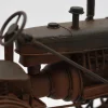 Miniaturmodel eines alten Treckers aus Zinn in Rostfarben – Bild 3